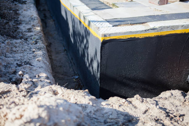Professional Emergency Waterproofing technician working in Adamsville, OH